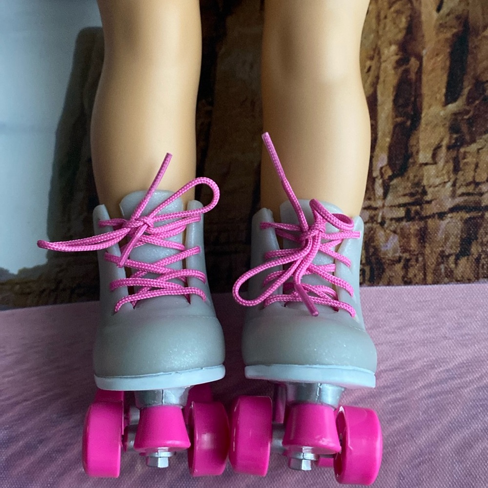 Our Generation Battat18" Doll.  Silver & Pink
Roller Skates.